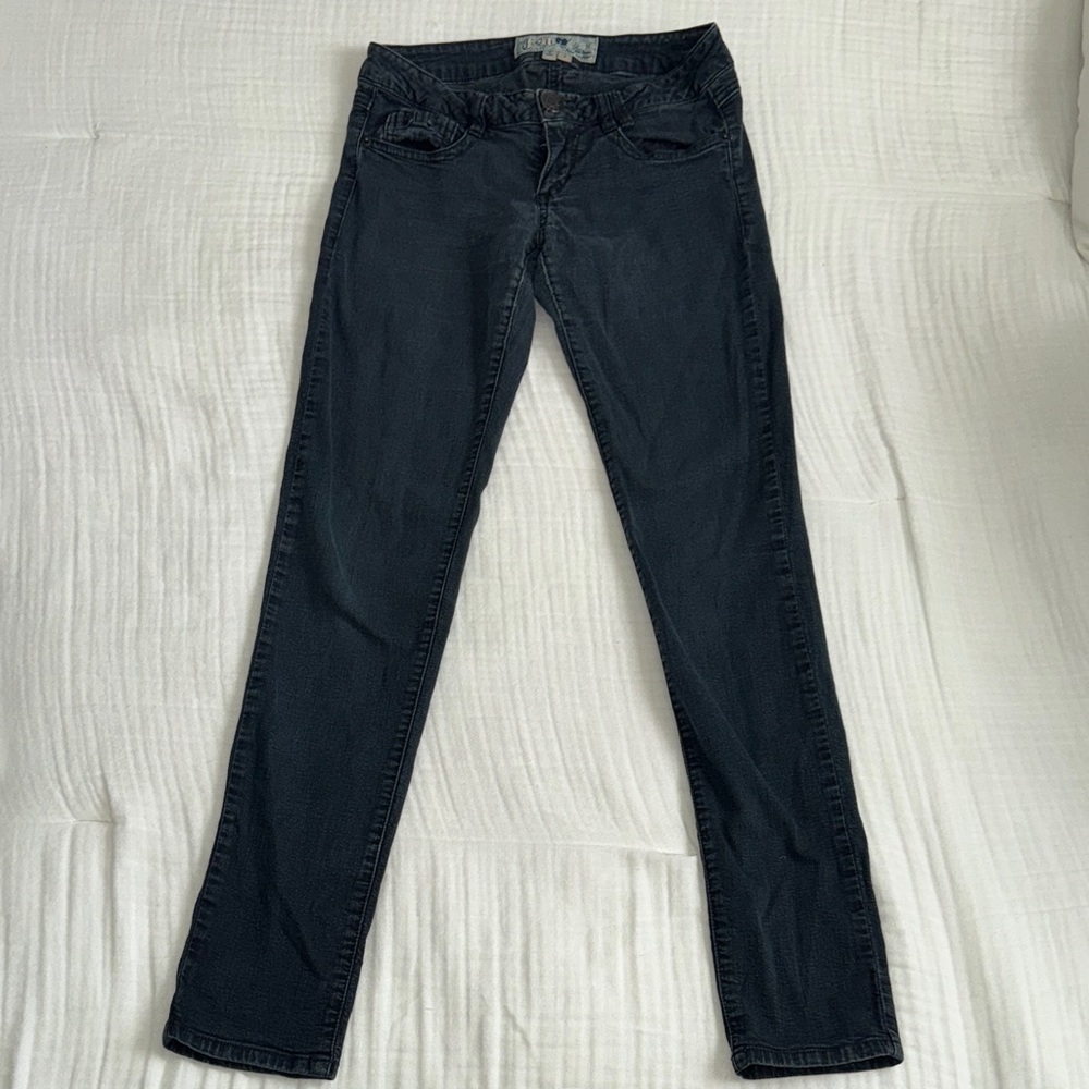 Jolt black skinny jeans with bow detail